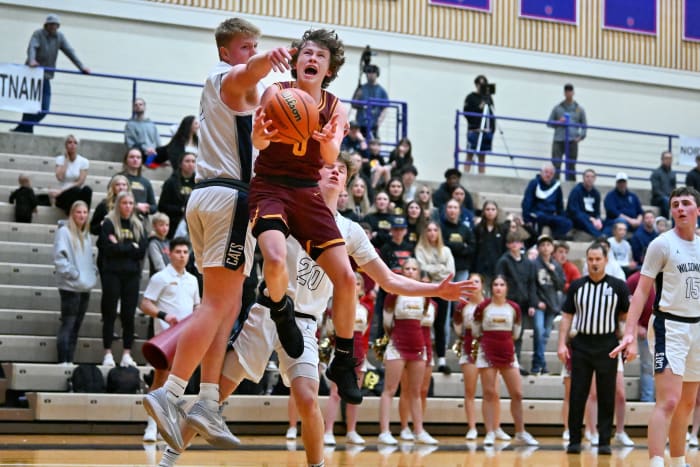 a Wilsonville Redmond 5A Oregon boys basketball quarterfinal 2024 Leon Neuschwander 45